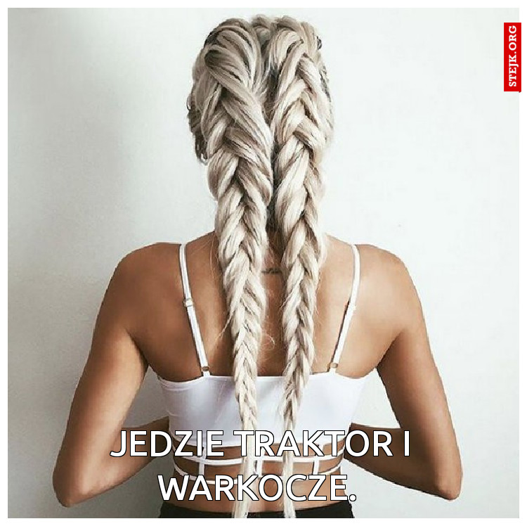 Jedzie traktor i warkocze. 